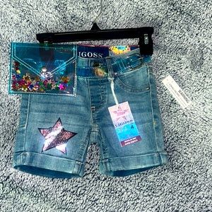 Denim shorts, regular rise, super stretchy. With a pouch belt. NWT. SIZE 4